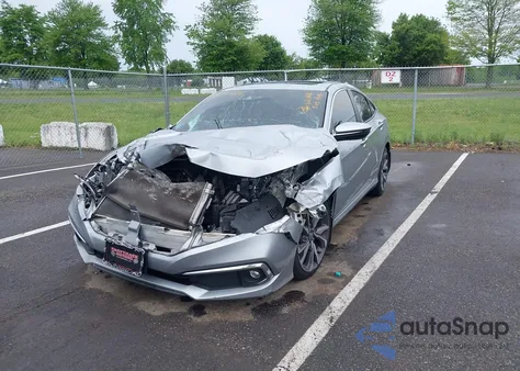 2019 Honda Civic Touring z USA, uszkodzony, nr VIN 19XFC1F91KE202367